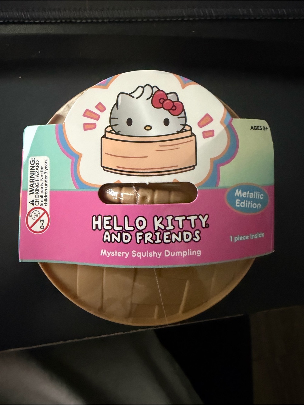 Hello Kitty Metallic Mystery Squishy Dumpling - Pink and Brown
